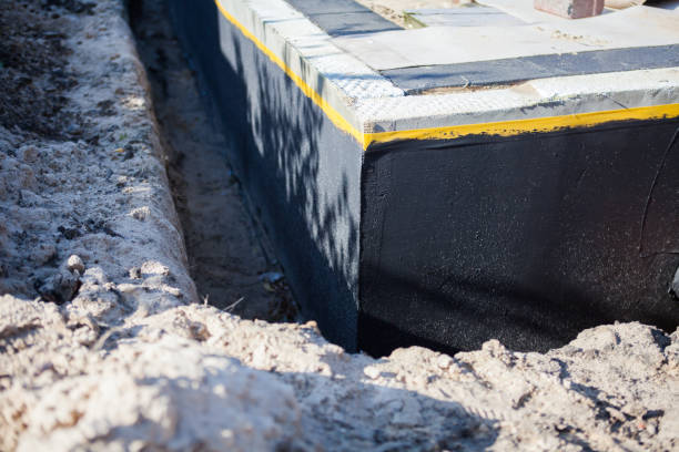 Professional Waterproofing technician working in Hartsville, TN